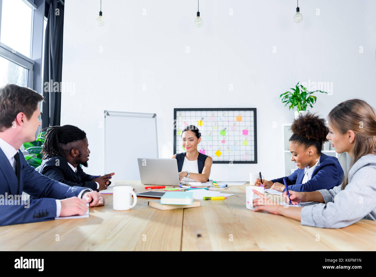 multiethnic colleagues having business meeting Stock Photo - Alamy