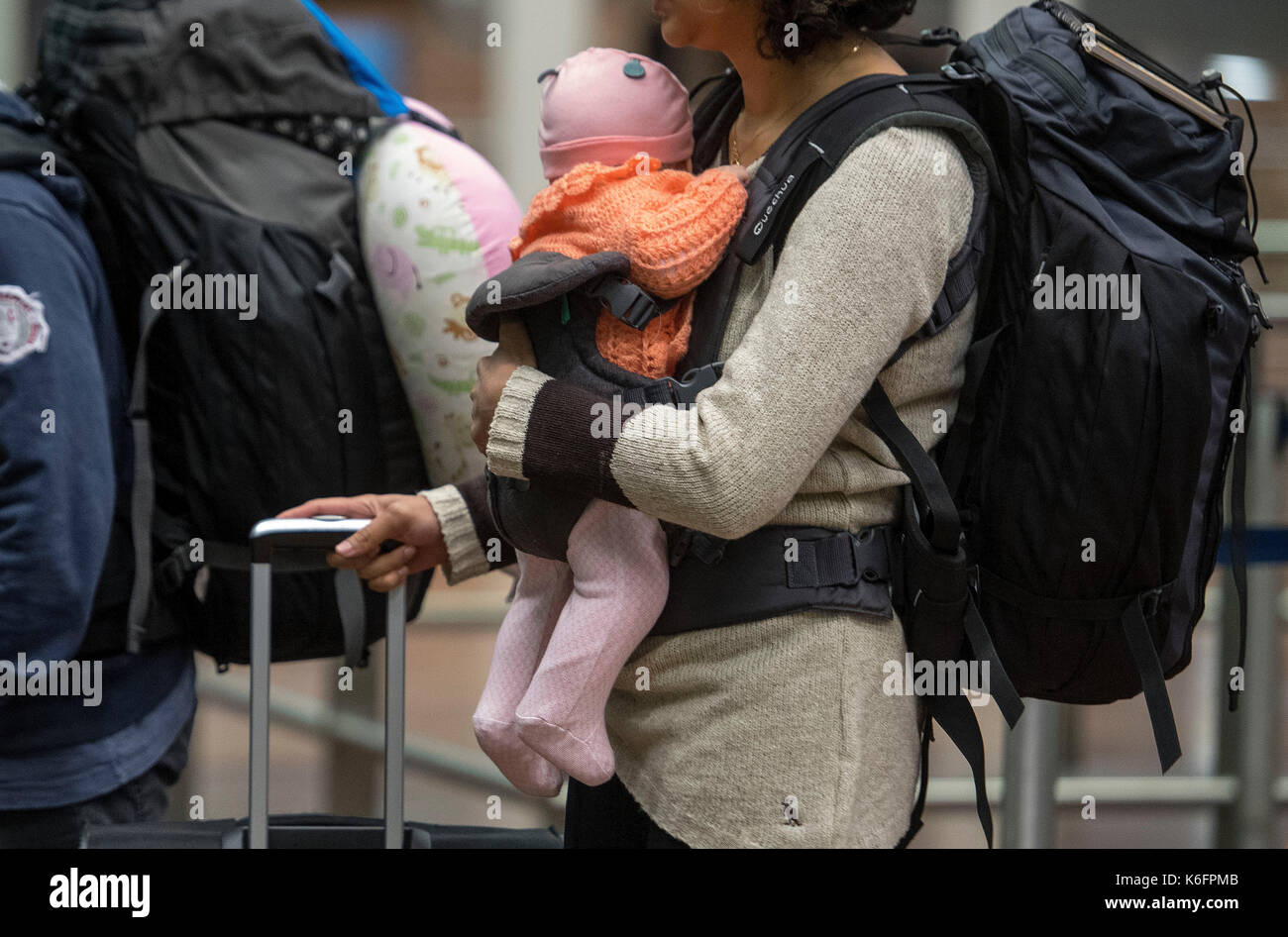 Embargoed to 1800 Tuesday September 12 A young child travels through Border Control after arriving on a Eurostar train from Paris as officers from the Metropolitan Police Service, British Transport Police, Kent Police and UK Border Force take part in Operation Limelight at the Eurostar terminal at St Pancras International in London, which is aimed at safeguarding children and vulnerable people from harmful practices and human trafficking. Stock Photo