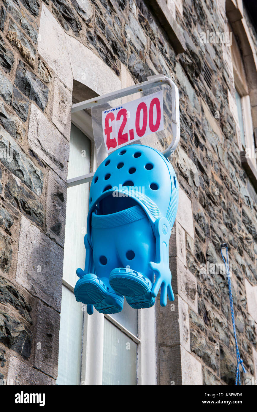 Crocs advertising sign on outside wall UK Stock Photo