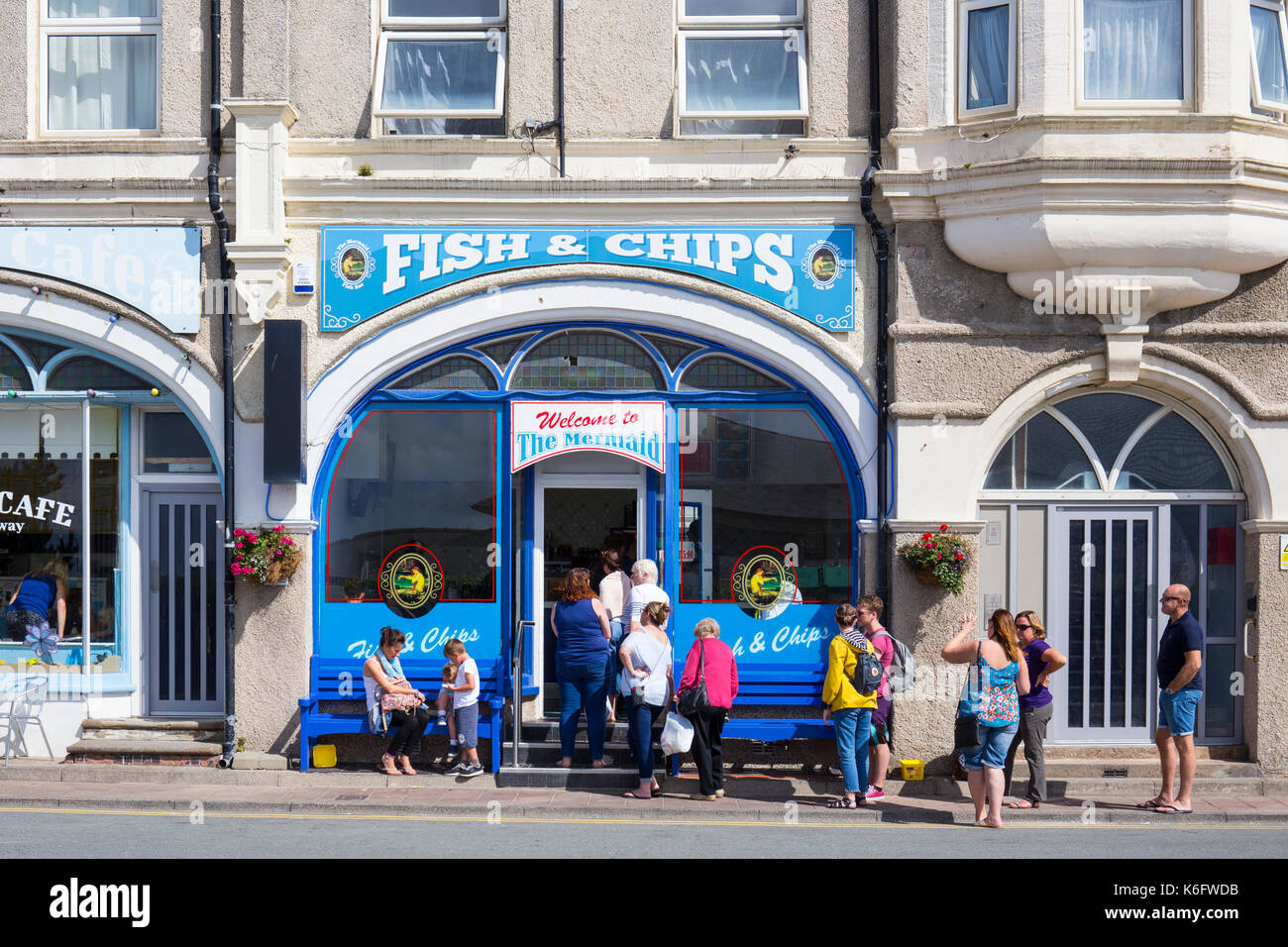 Queue outside The Mermaid fish & chips shop in Barmouth Gwynedd Nort h Wales UK Stock Photo