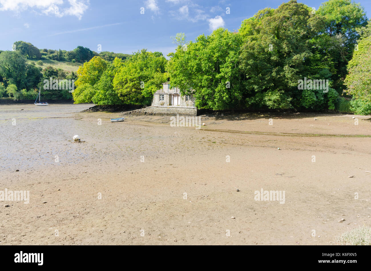 Boat house at Batson on the Salcombe Estuary at low tide Stock Photo