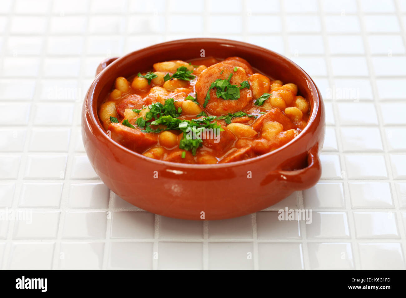 Braised with chorizo and white kidney beans, spanish tapas food,guiso