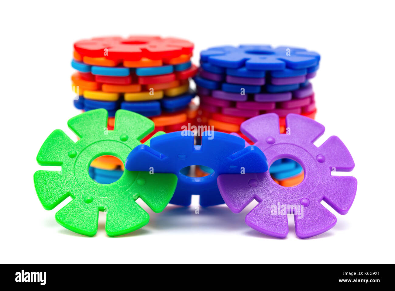 colorful plastic snowflake toy on white background Stock Photo - Alamy
