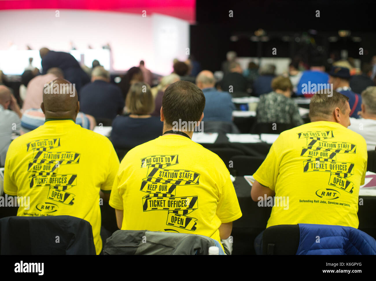 Members of the RMT union at the TUC conference in Brighton wearing T shirts saying 'No cuts to station staff-Keep our ticket offices open' Stock Photo