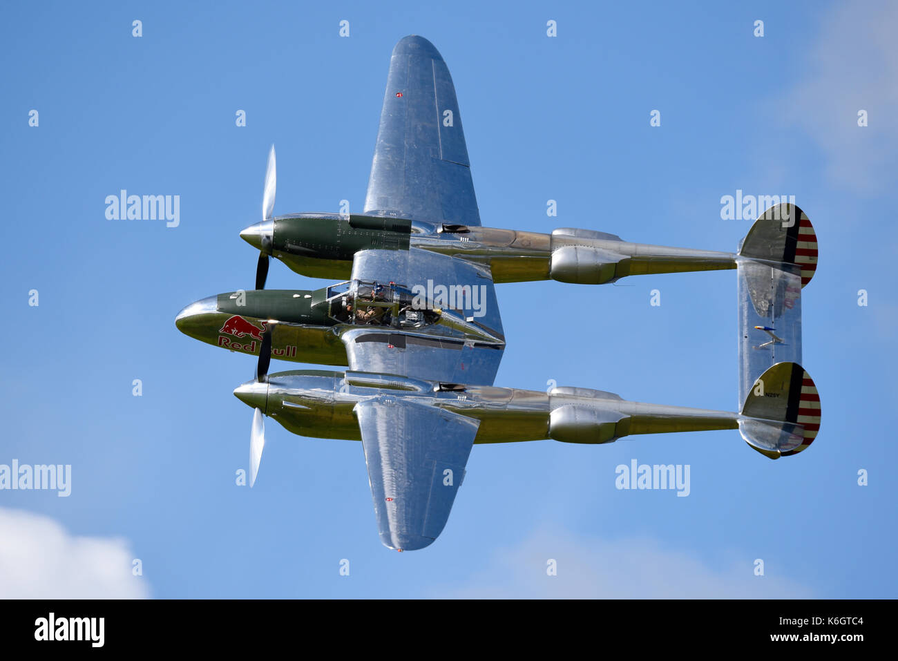 Flying Bulls Red Bull sponsored Lockheed P-38 Lightning fighter plane  flying at the Goodwood Revival 2017. Space for copy Stock Photo - Alamy