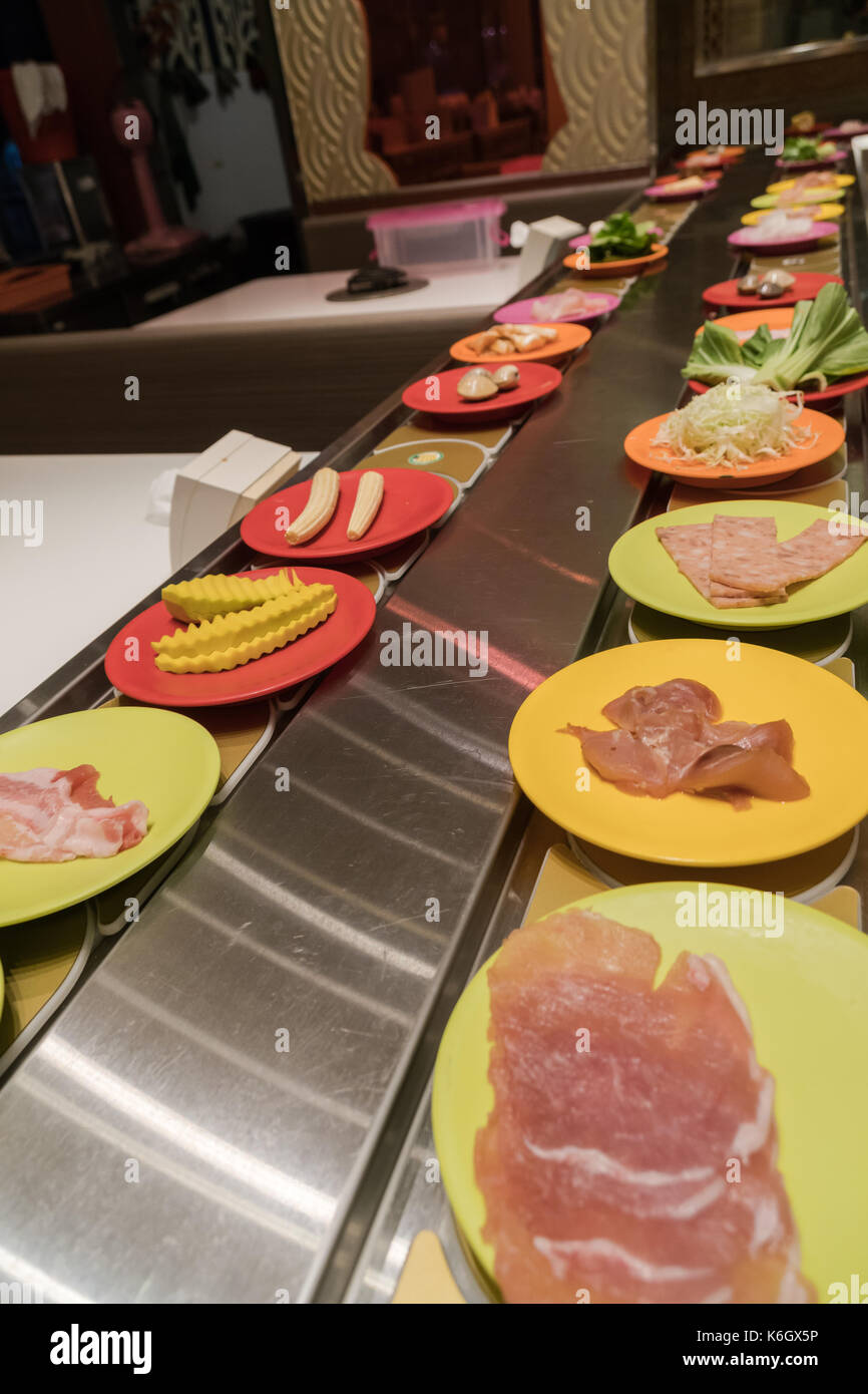 Shabu Japanese Conveyor belt sushi or belt buffet Stock Photo