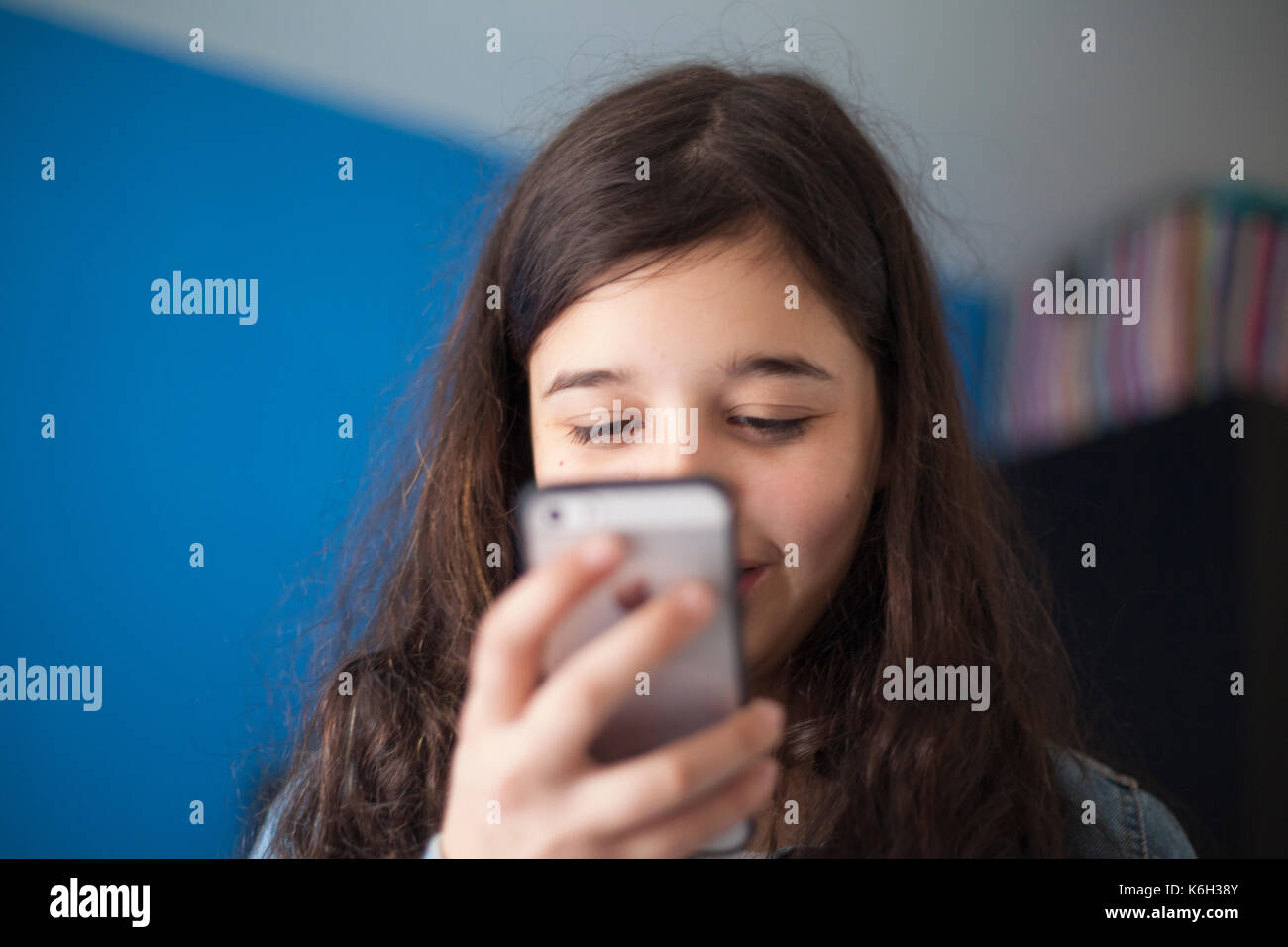 teenage girl on phone Stock Photo