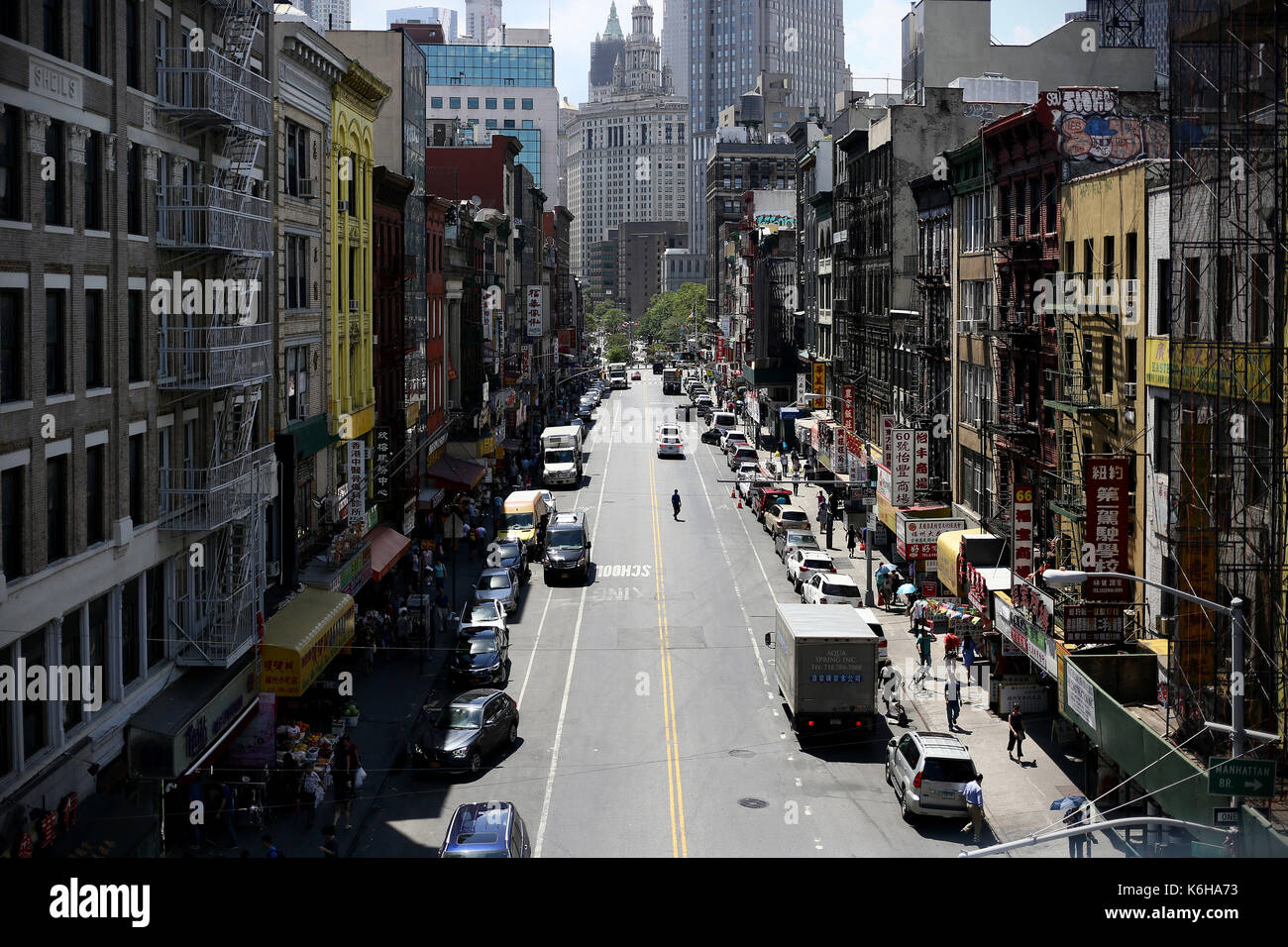 CHINATOWN, NEW YORK, USA - JUNE 2016 - View of Chinatown from the Manhattan Bridge. At the back the financial district Stock Photo