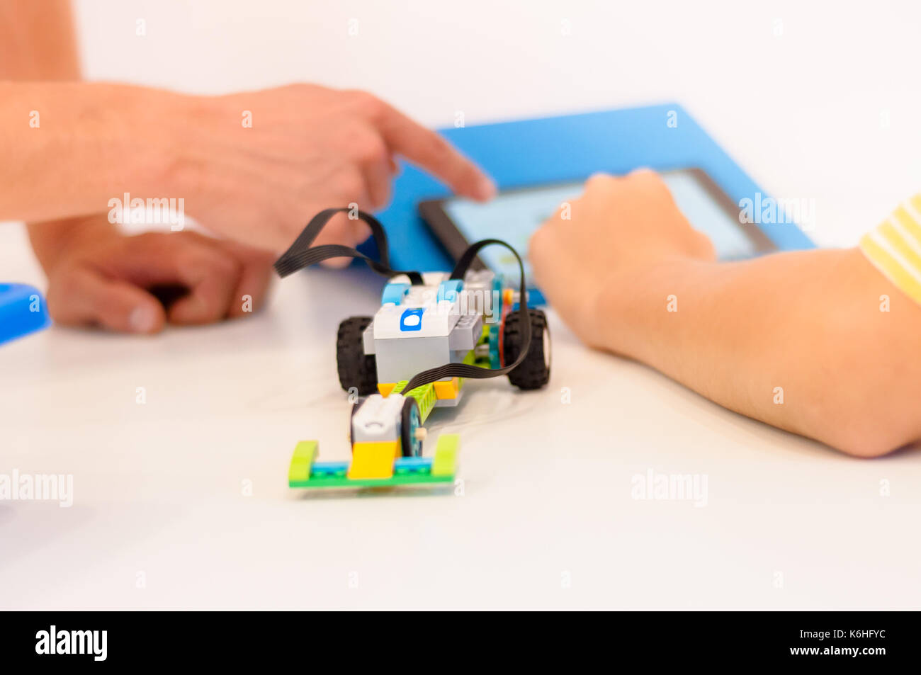 Kids building robots in classroom Stock Photo