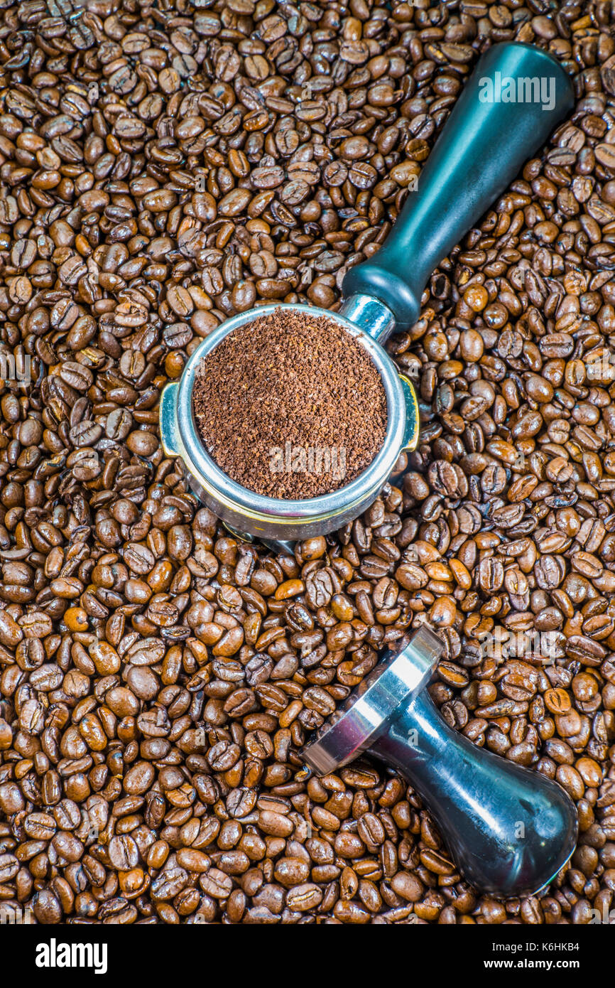 Espresso making concept Ground coffee in an espresso machine