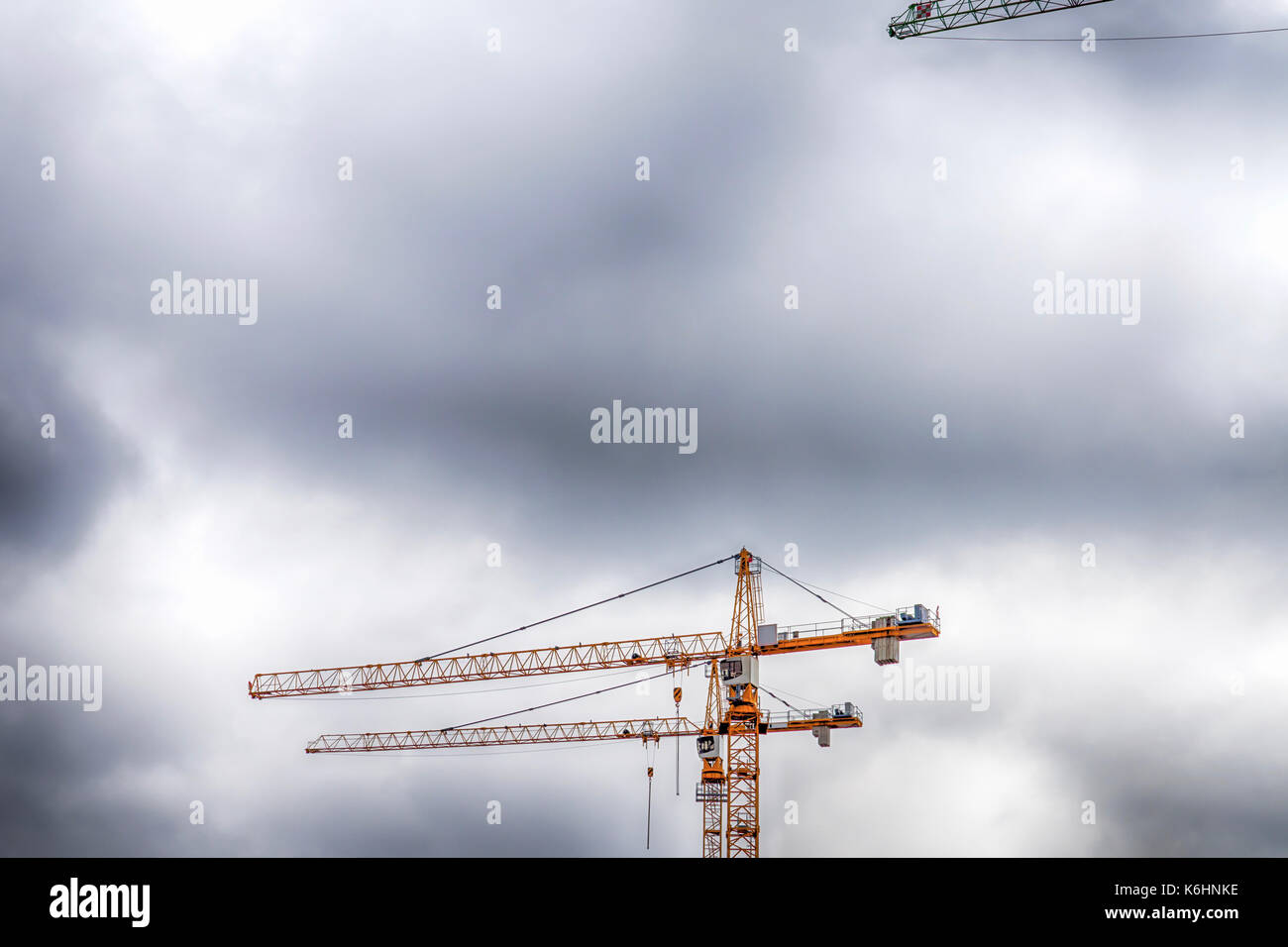 Construction cranes in the Hafencity of Hamburg, Germany Stock Photo
