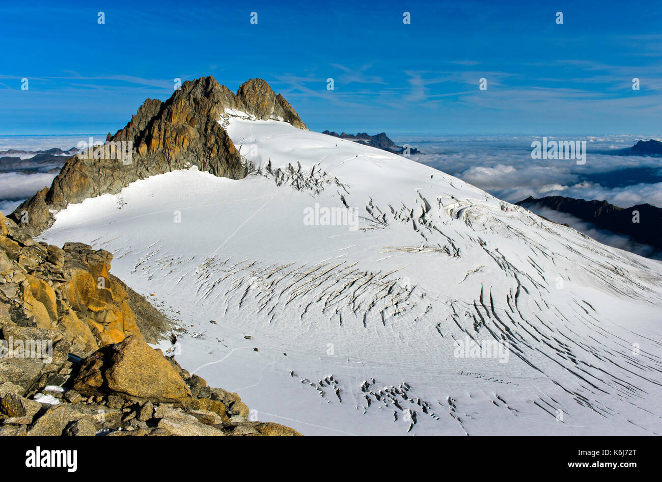 Peak Aiguille du Tour rising above the glacier Plateau du Trient ...