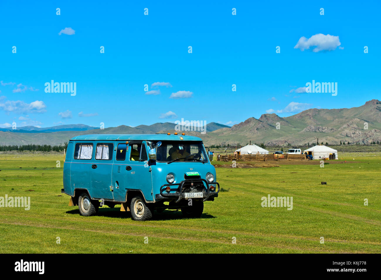 Russian minibus UAZ-452 for tourists near a yurt settlement, Orkhon Valley, Khangai Nuruu National Park, Oevoerkhangai Aimag province, Mongolia Stock Photo