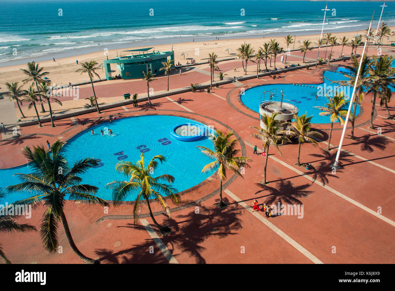 Aerial view of children playing in public pools near promenade of Golden Mile on Durban, South Africa Stock Photo