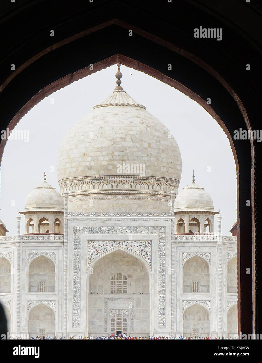 Taj Mahal as seen through the arch of the entry gate Stock Photo