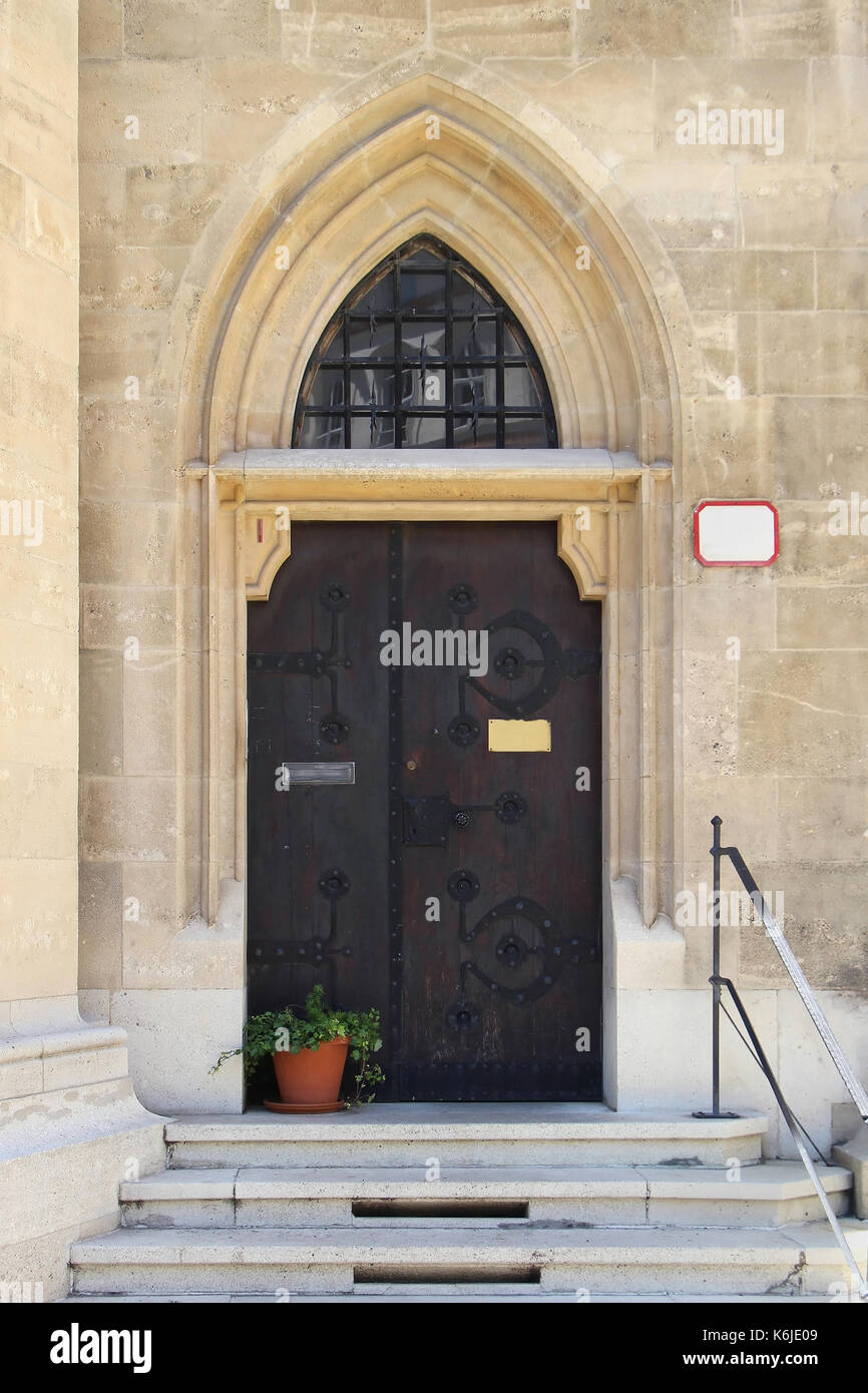 Old architecture entrance door exterior with stone facade Stock Photo ...