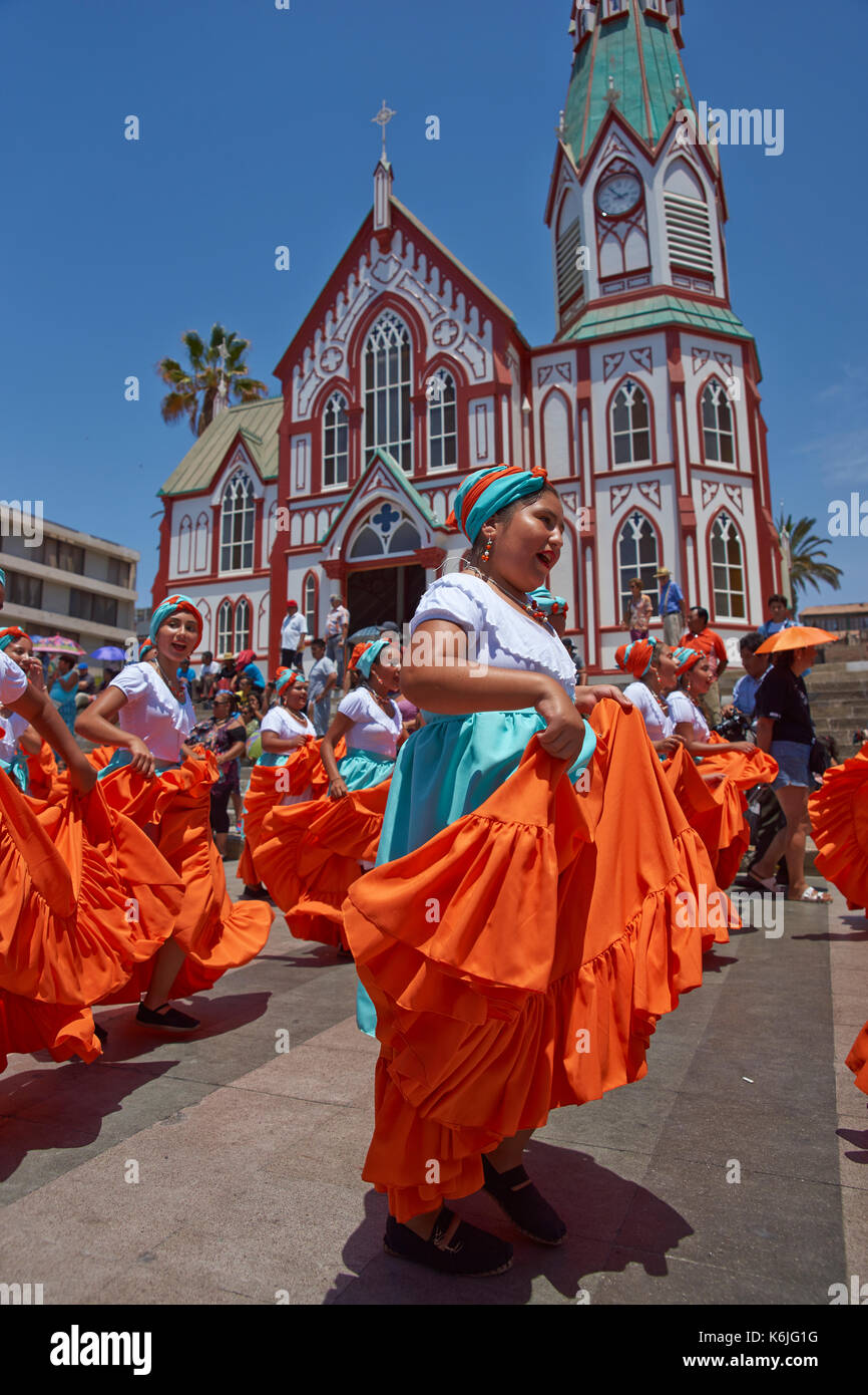 Female dancers from the group Tumba Carnaval, performing at the annual  street carnival celebrating the strength of the sun in Arica, Chile Stock  Photo - Alamy