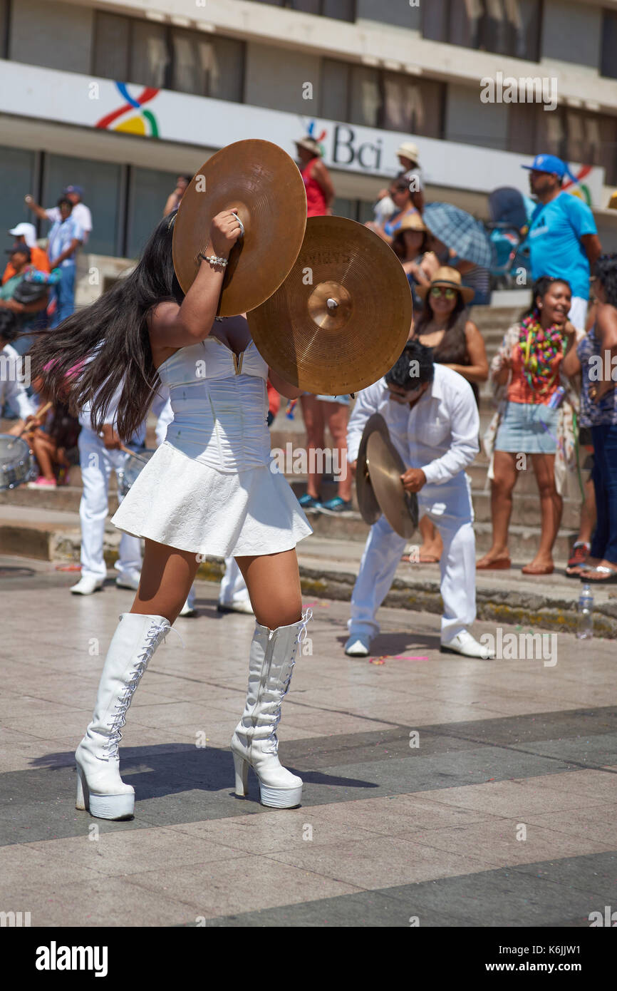 Band of a Morenada Dance Group performing during a street parade at the annual Andean Carnival in Arica, Chile Stock Photo
