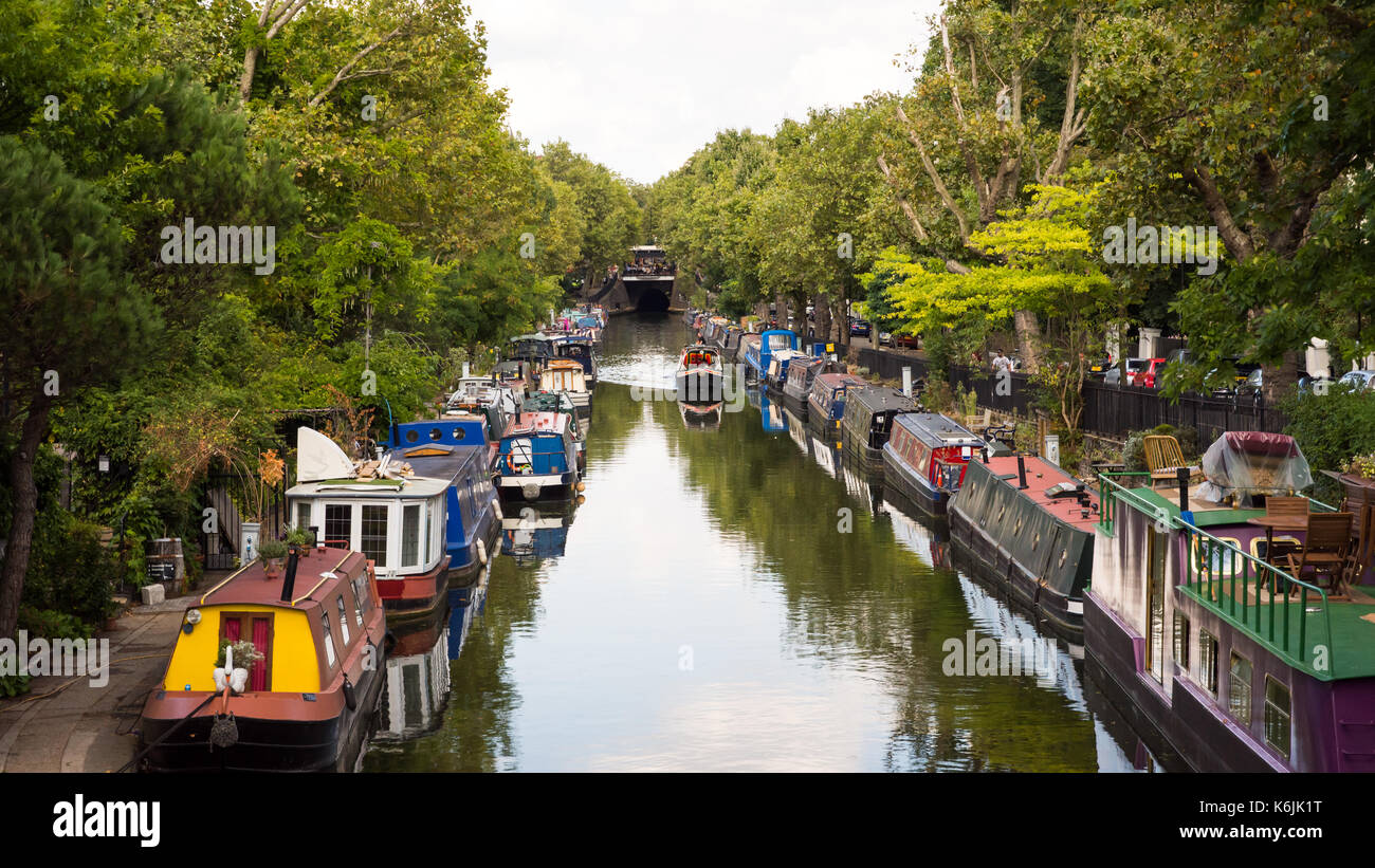 London, England, UK - August 29, 2016: Traditional narrowboats and houseboats moored on the Regent's Canal at Little Venice in west London. Stock Photo