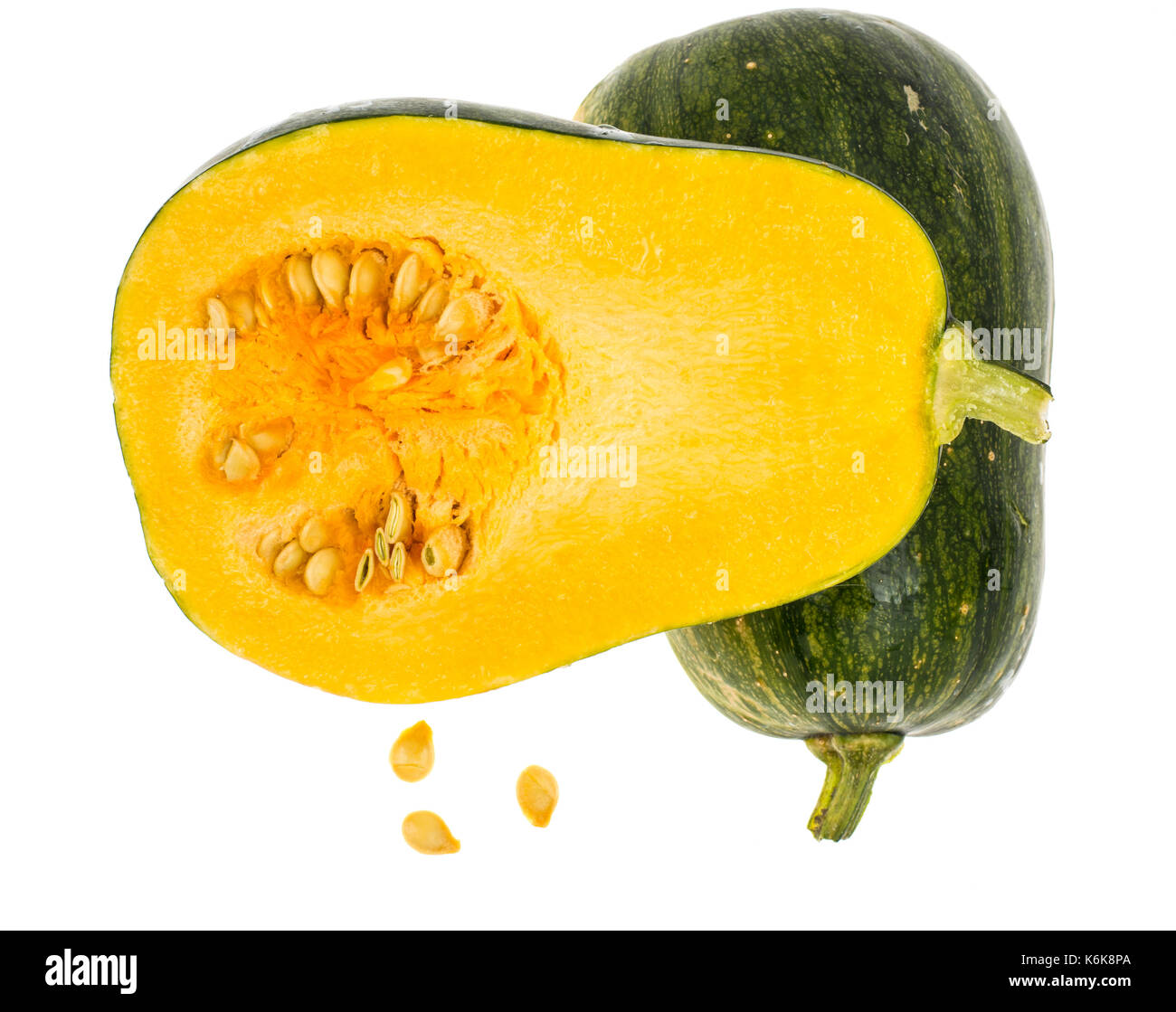 Muscat pumpkin, cut in half, isolated on white background. Studio Photo Stock Photo