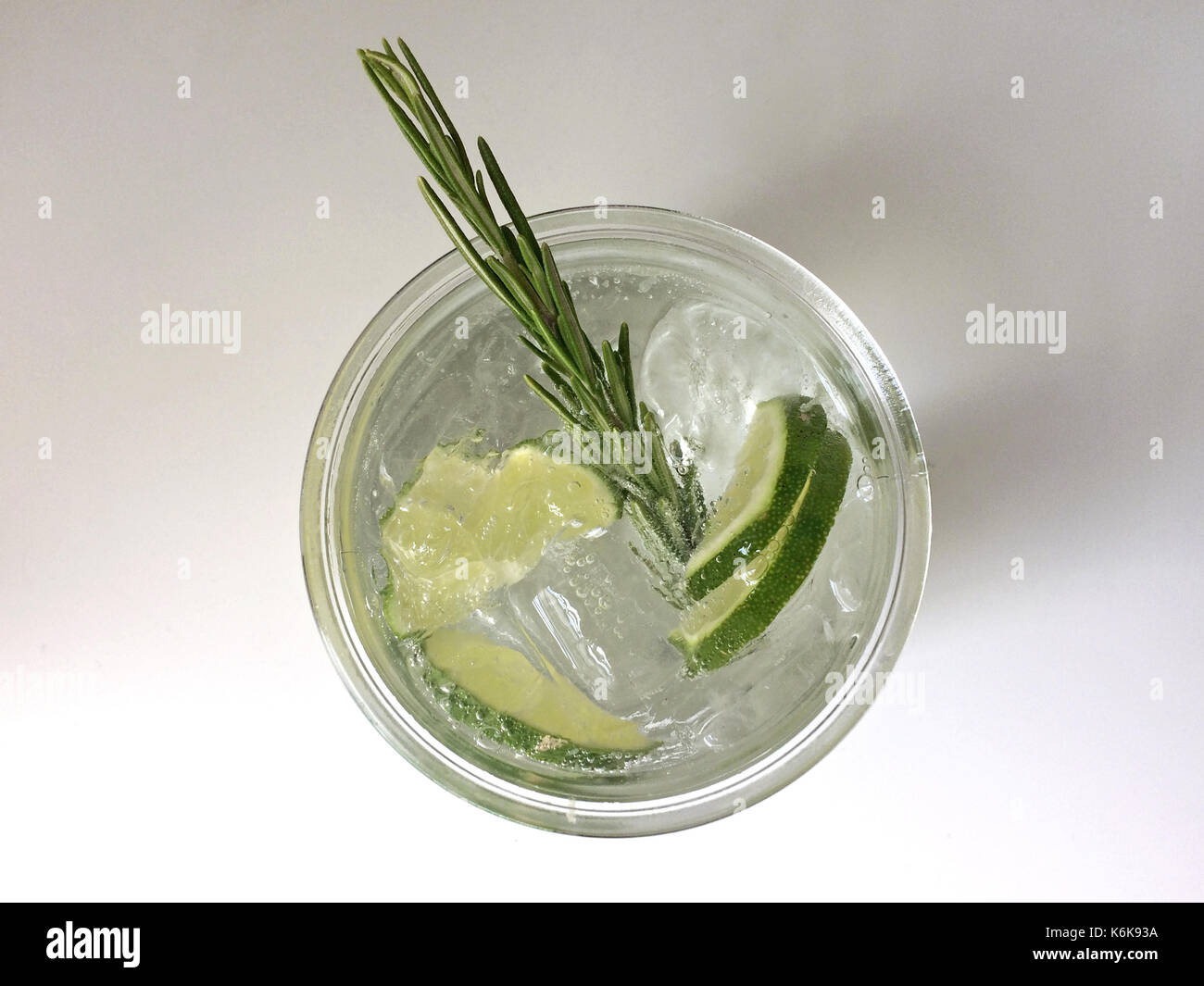 Classic Gin and Tonic cocktail with lime, lemon & rosemary Stock Photo