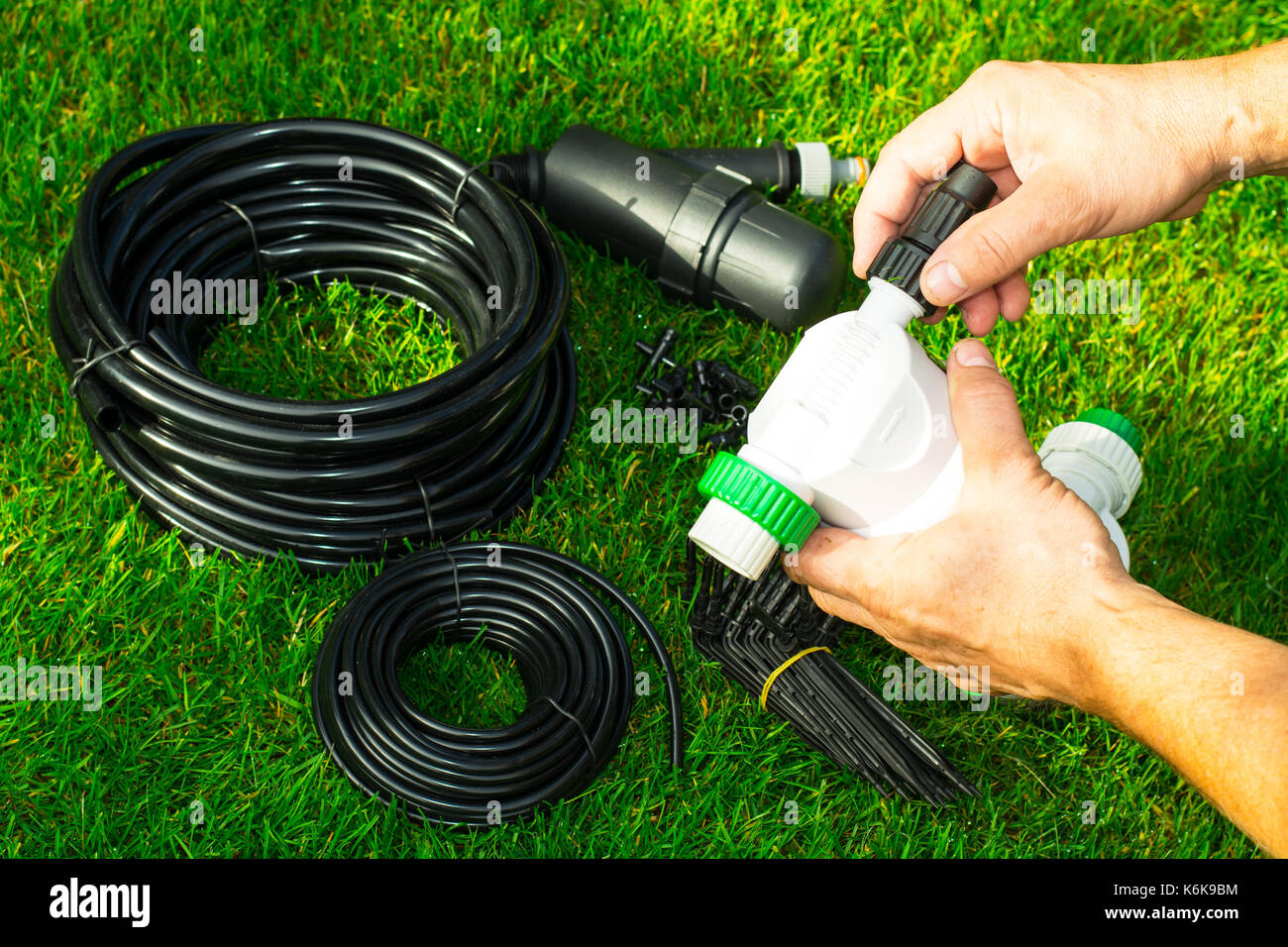 Automatic watering system for plants in beds. Studio Photo Stock Photo