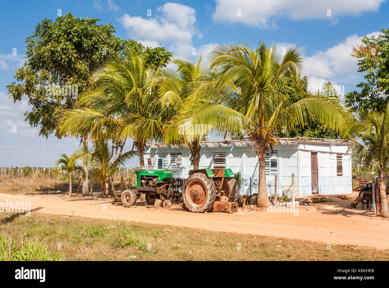 Broken tractor on a dilapidated smallholding farm near Cienfuegos, a city on the south coast of Cuba Stock Photo