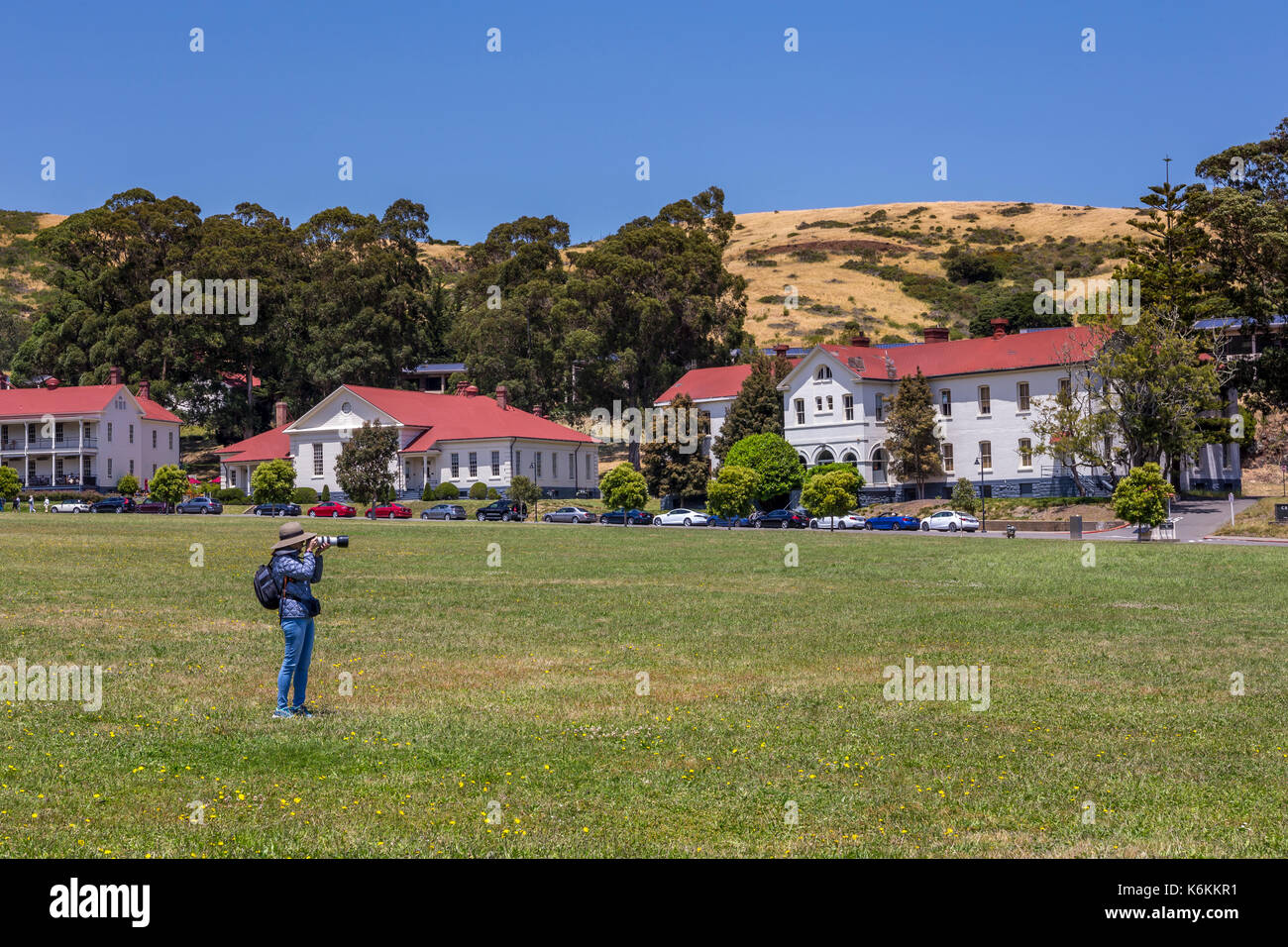 adult woman, photographer, photographing, Cavallo Point Lodge, The Lodge at the Golden Gate, Fort Baker, city of Sausalito, Marin County, California Stock Photo