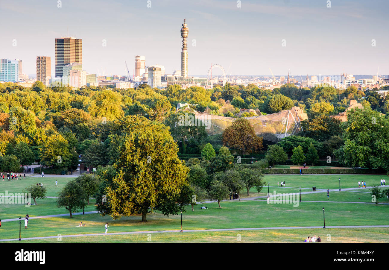 London, England, UK - August 30, 2016: The view over London Zoo, Regent's Park, and the London skyline from Primrose Hill in north London. Stock Photo