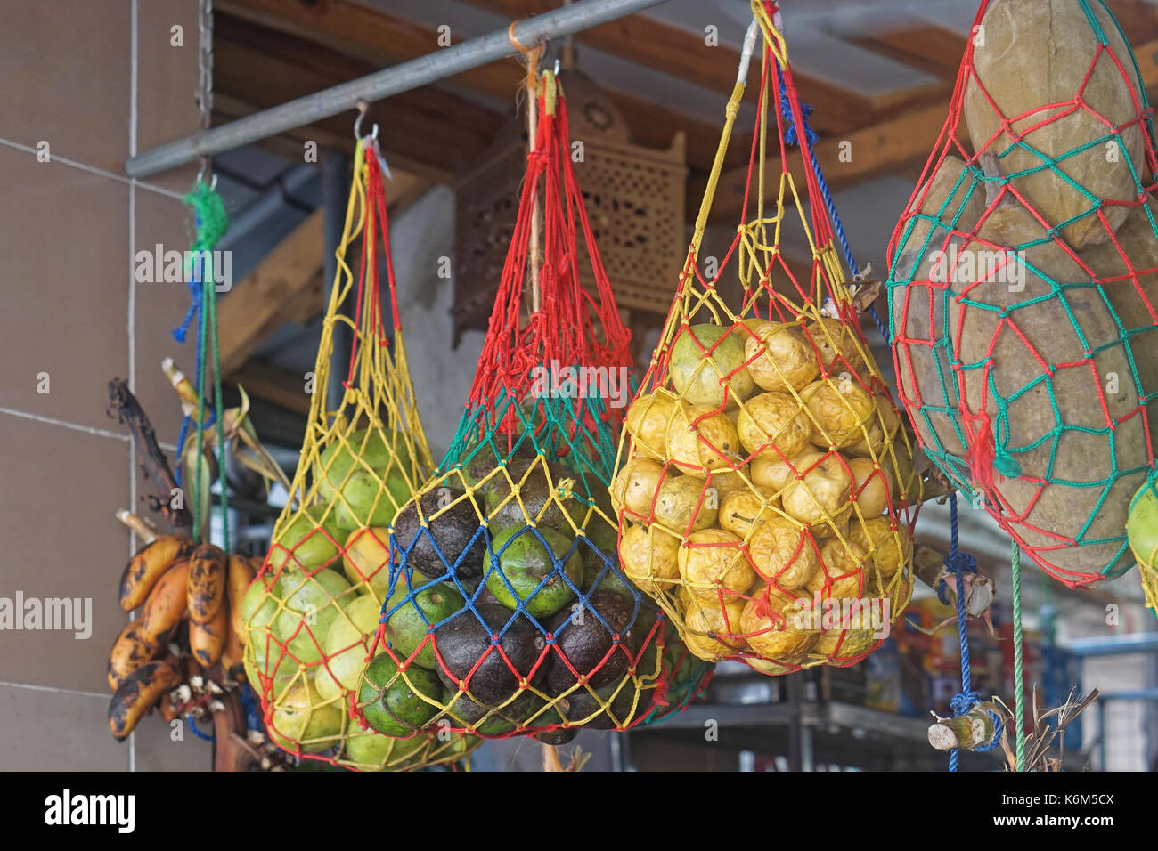 African tropical fruits in nets Stock Photo