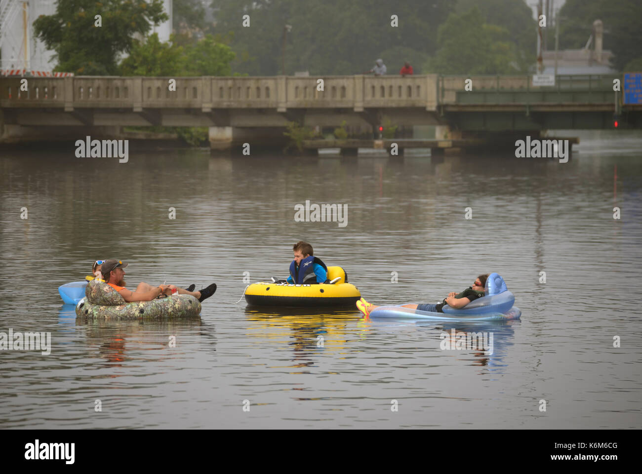 Men on rafts in hi-res stock photography and images - Alamy
