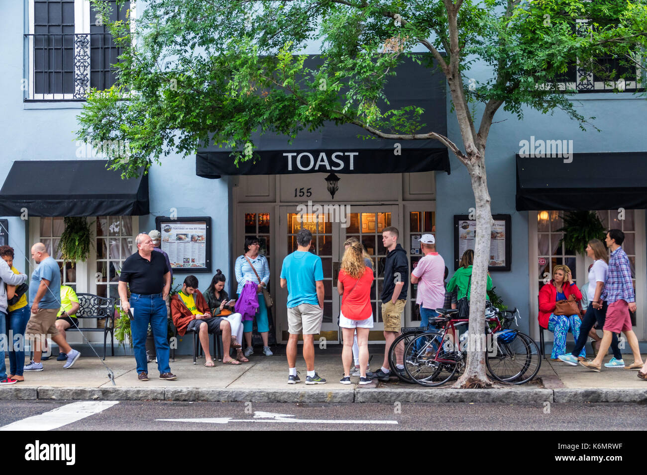 Charleston South Carolina,historic Downtown,Toast,restaurant restaurants food dining cafe cafes,outside exterior,waiting,line,queue,popular,SC17051408 Stock Photo