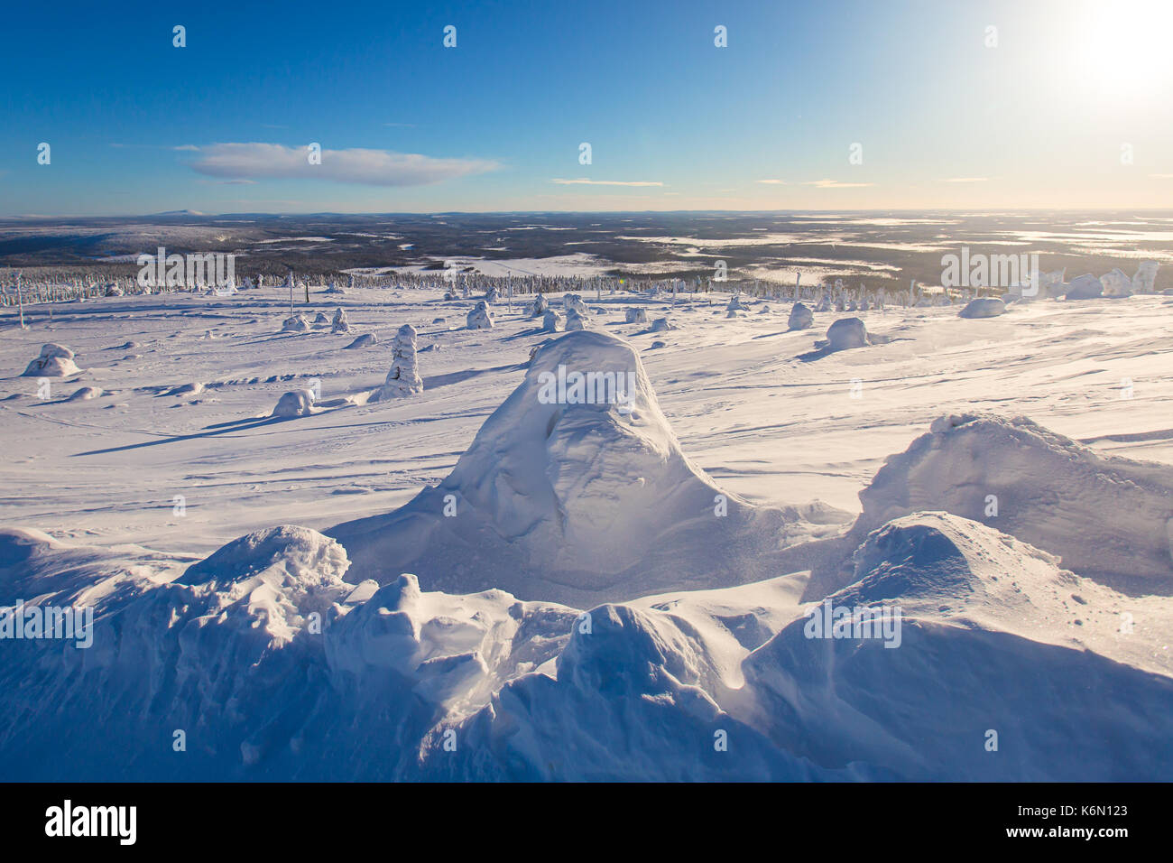 Beautiful cold mountain view of ski resort, sunny winter day with slope, piste and ski lift Stock Photo
