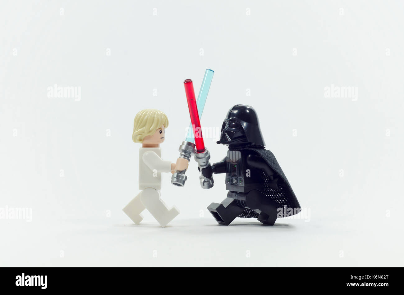 lego darth vader and luke skywalker fighting sword Stock Photo - Alamy