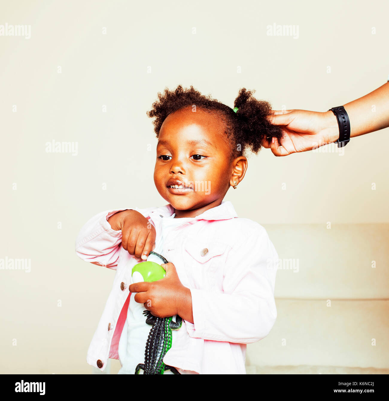 Little Cute Sweet African American Girl Playing Happy With Toys