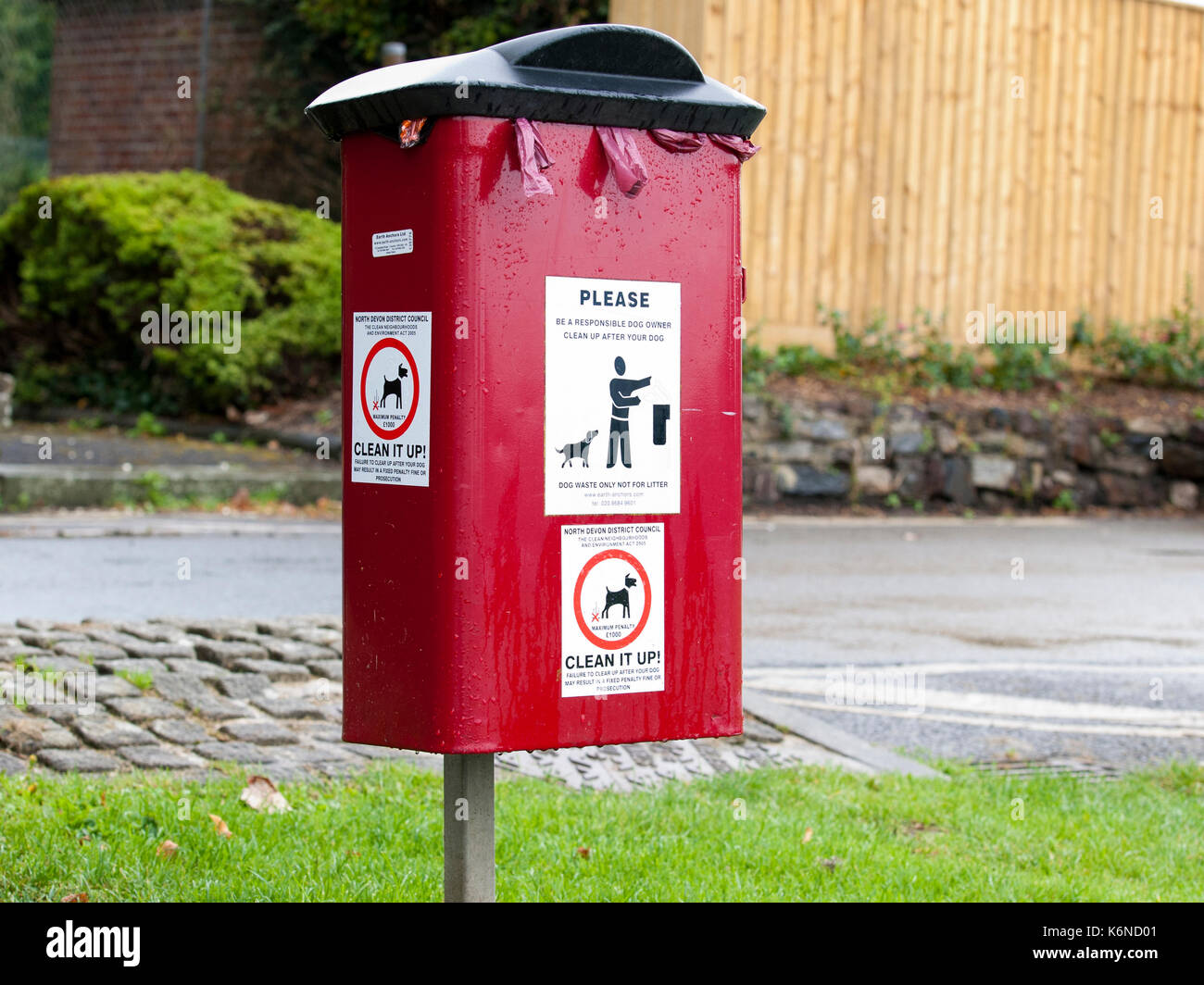 Dog waste bin in Rock Park, Barnstaple Devon, Dog poo bin Stock Photo