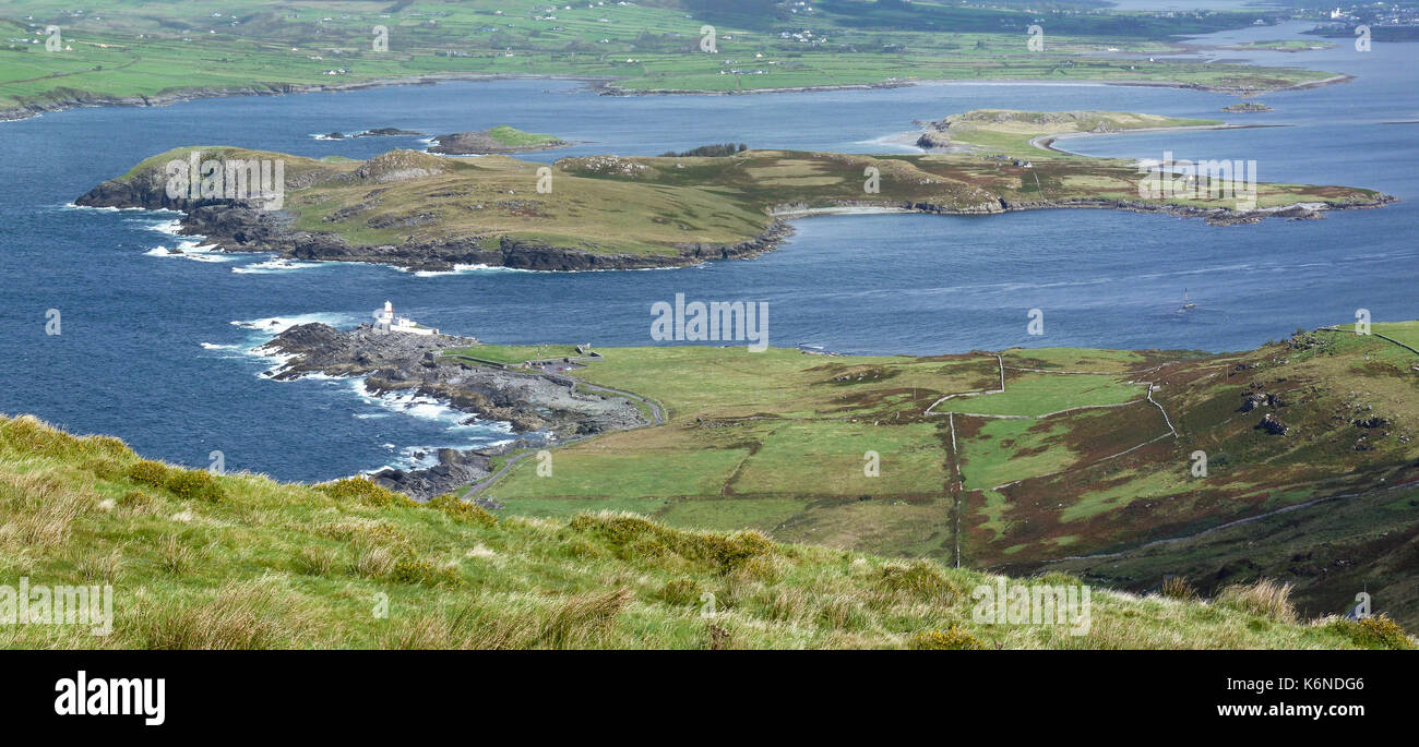 Beginish Island and Valentia Lighthouse in Valentia Harbour, South Kerry, Ireland Stock Photo