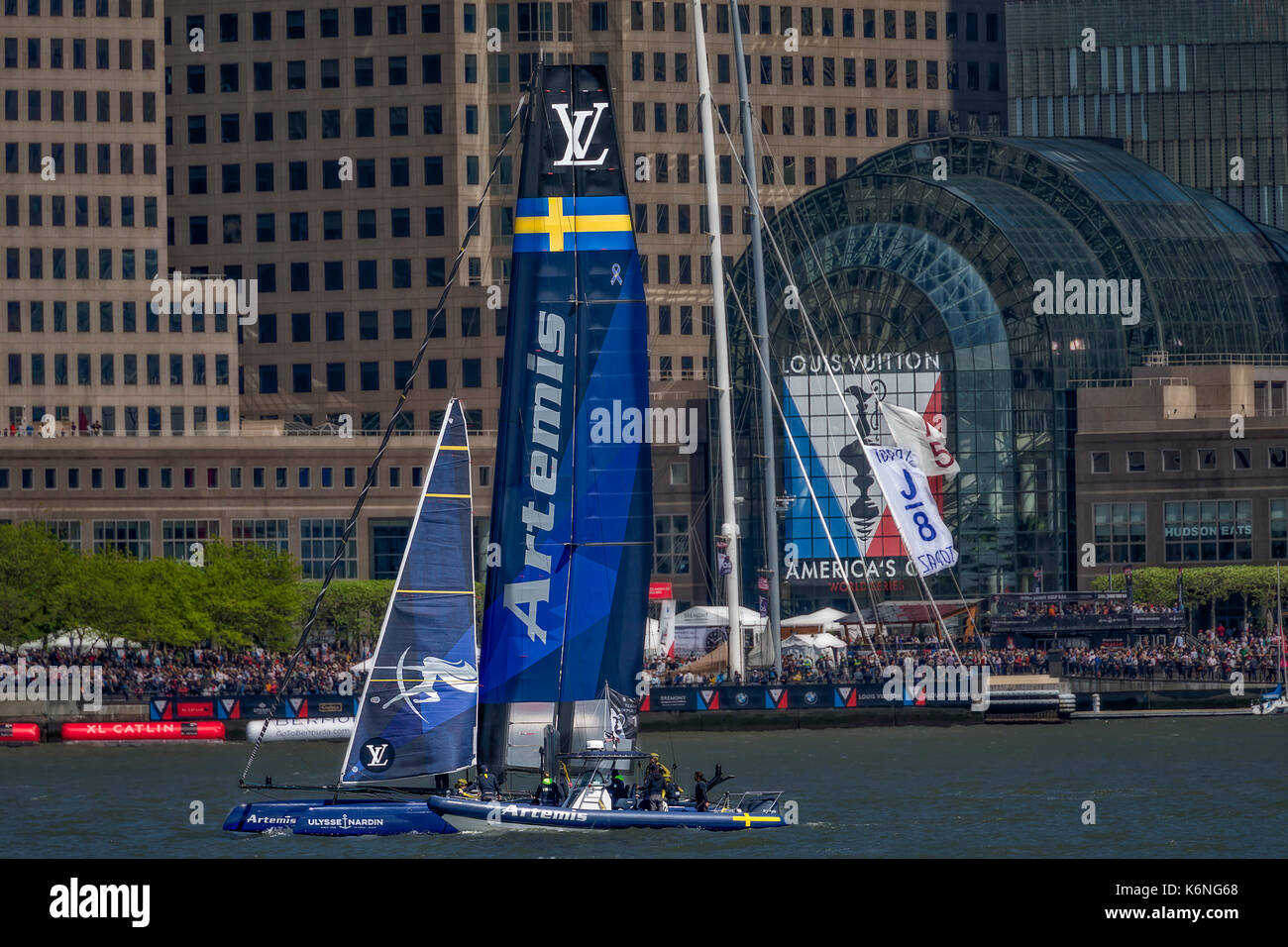 Americas Cup Artemis Racing NYC - Artemis Racing for Sweden yacht on the Hudson River by the Winter Garden Atrium in New York City's Brookfield in Lower Manhattan during the Louis Vuitton America's Cup in New York City. Available in color and black and white. To view additional images please visit www.susancandelario.com Stock Photo