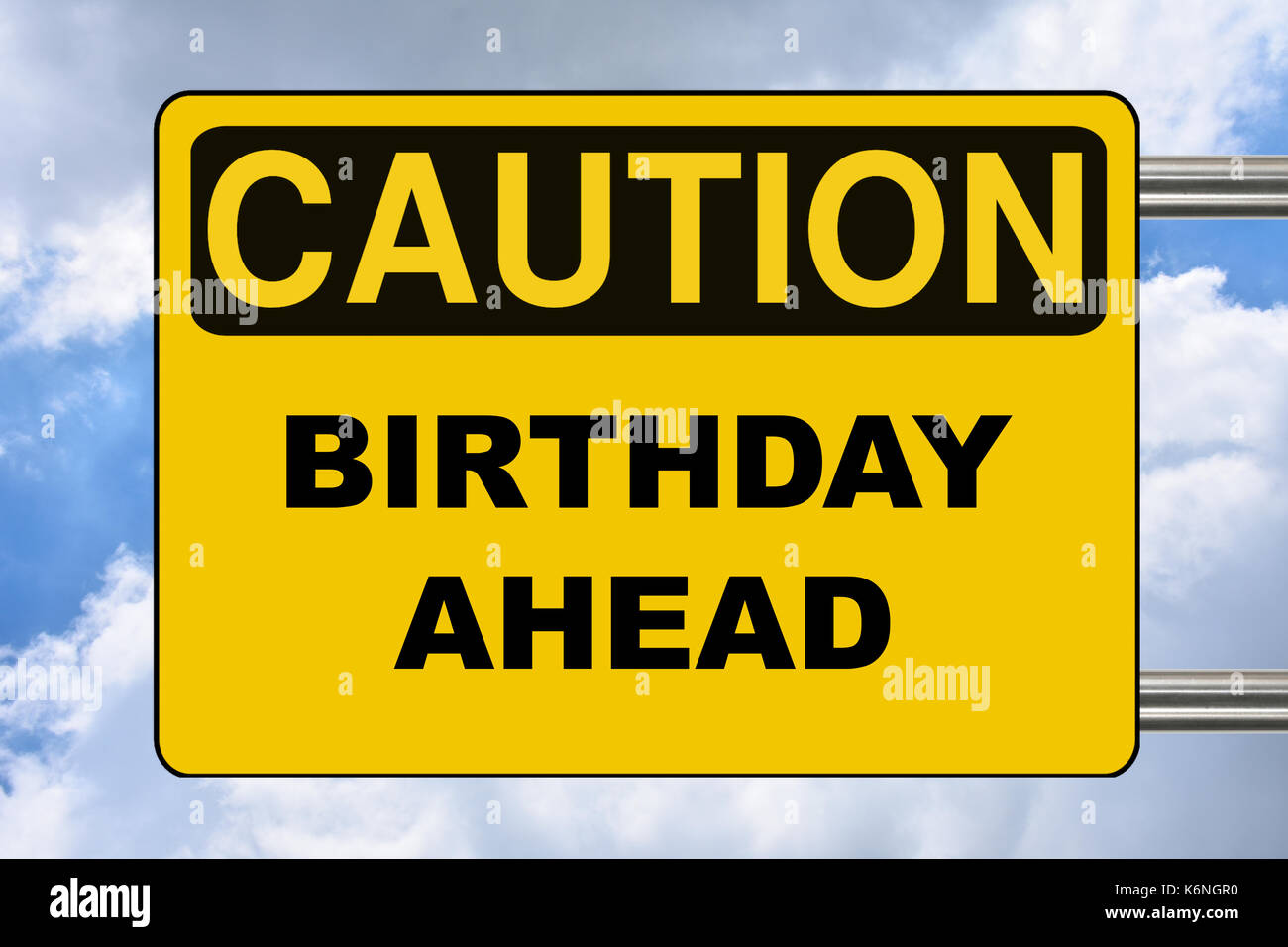 Birthday ahead, yellow warning street sign Stock Photo