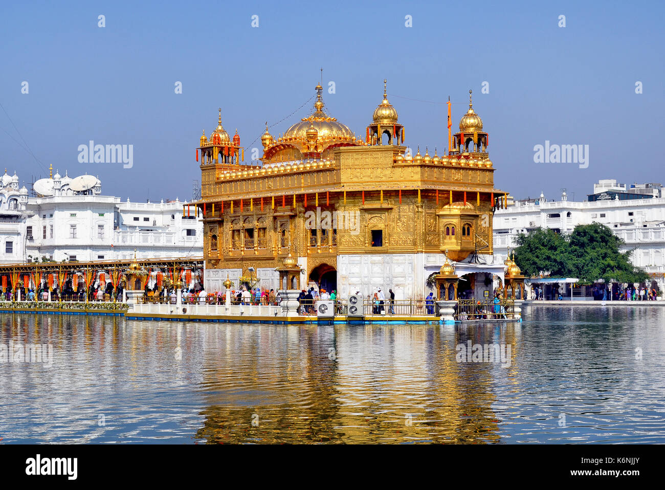 AMRITSAR, INDIA - 30 OCTOBER 2015: Golden Temple (Harmandir Sahib) in Amritsar, Punjab, India, the holiest Sikh gurdwara in the world. Stock Photo