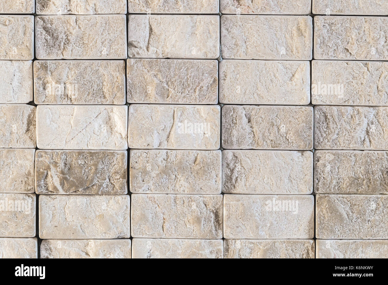 Texture of repeating small gray stones in the wall Stock Photo - Alamy