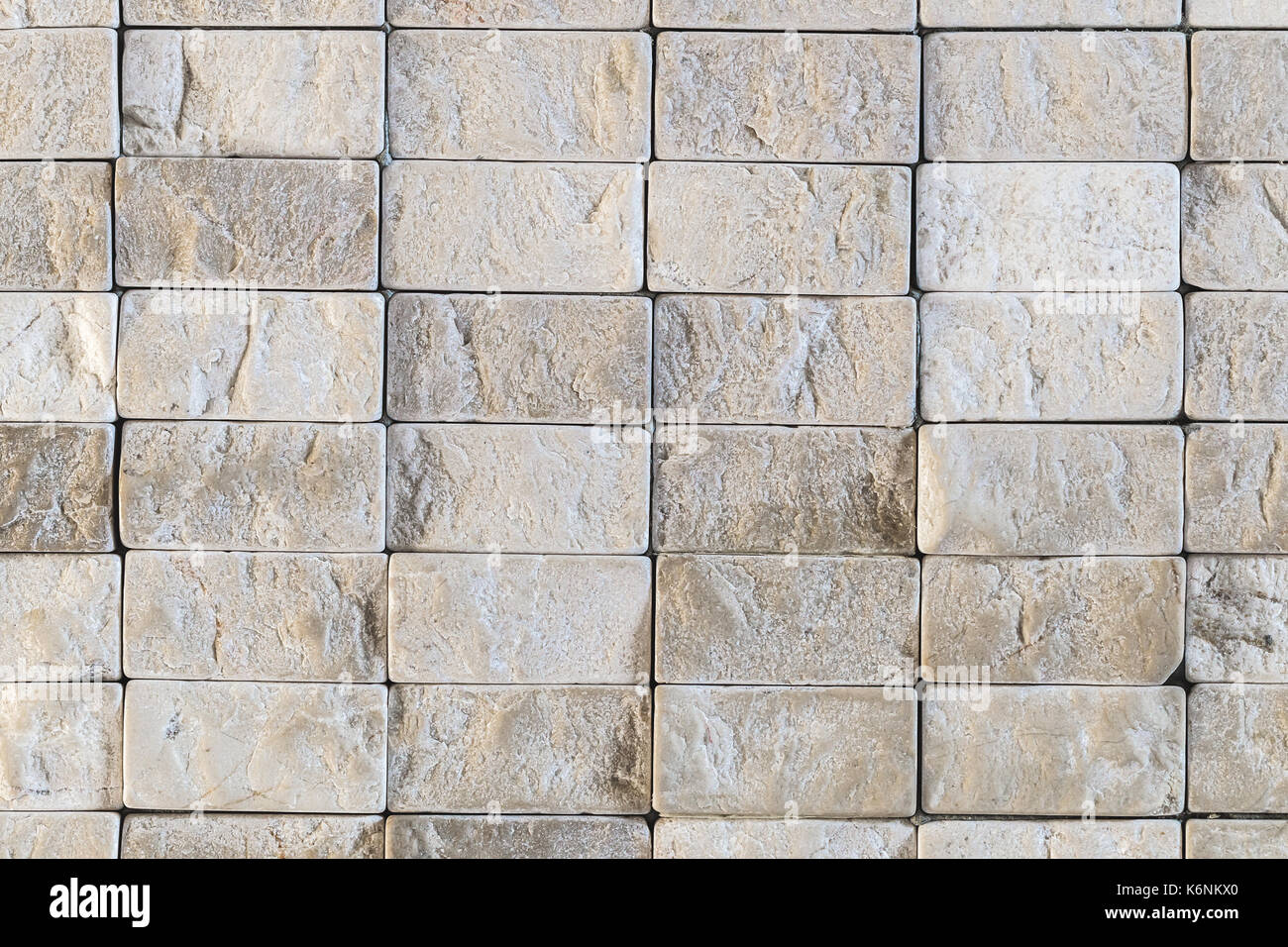 Texture of repeating small gray stones in the wall Stock Photo - Alamy