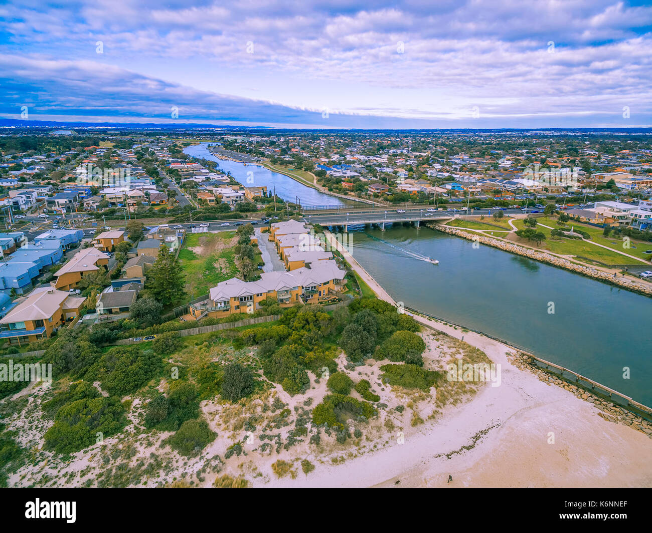 Aerial view of urban area and bridge across river Stock Photo