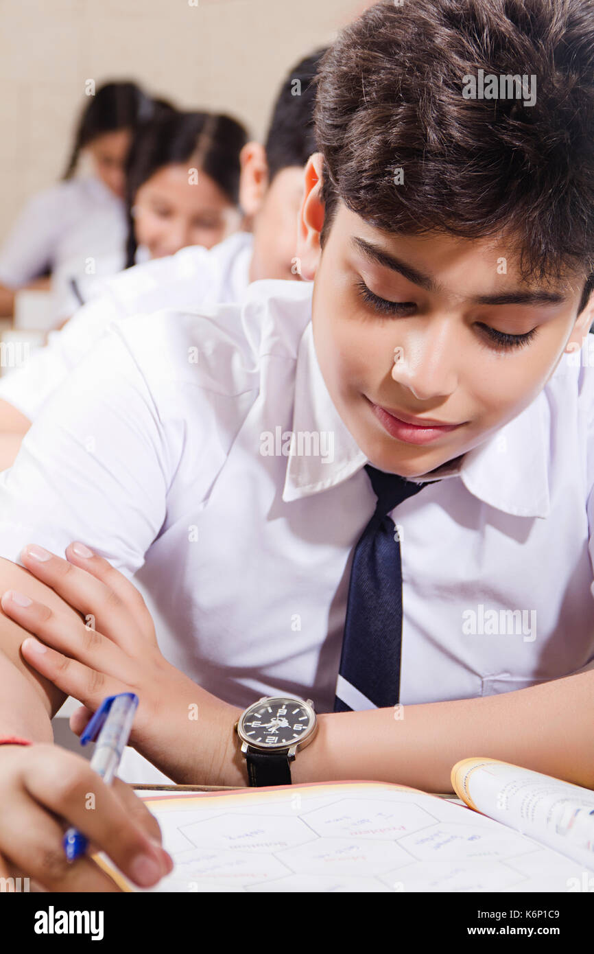 Smiling Indian 1 High School Boy Student Reading Book Studying Education In Class Stock Photo