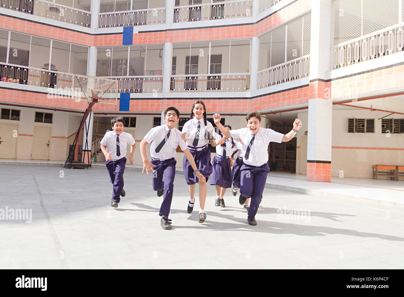 Laughing school girls hi-res stock photography and images - Alamy