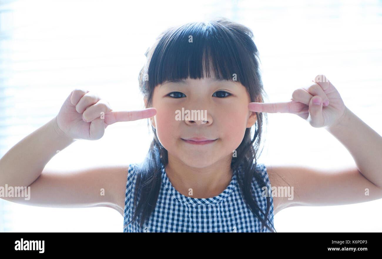 Closeup portrait of young cute asian little girl . Stock Photo