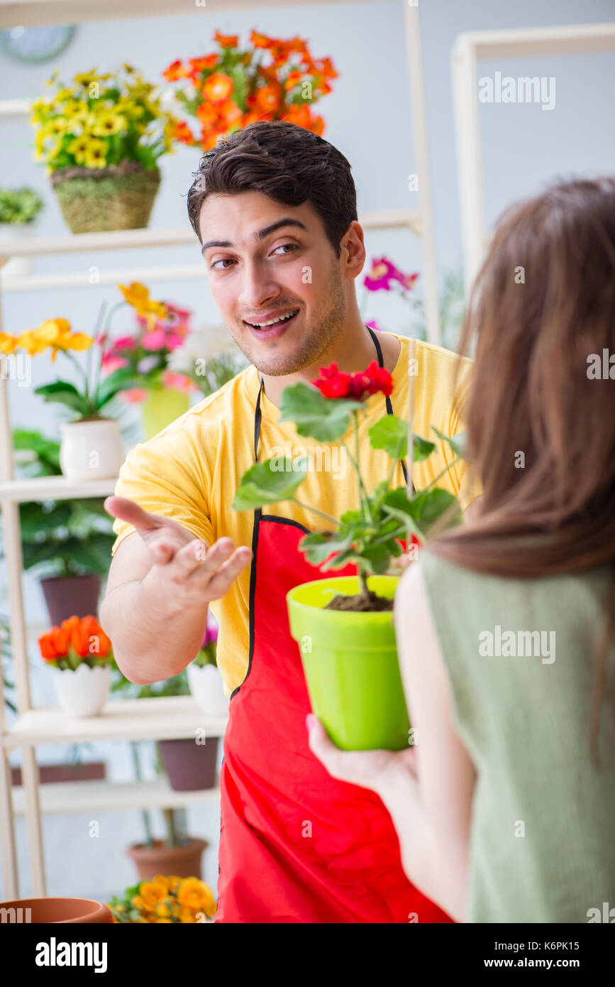 Florist selling flowers in a flower shop Stock Photo Alamy