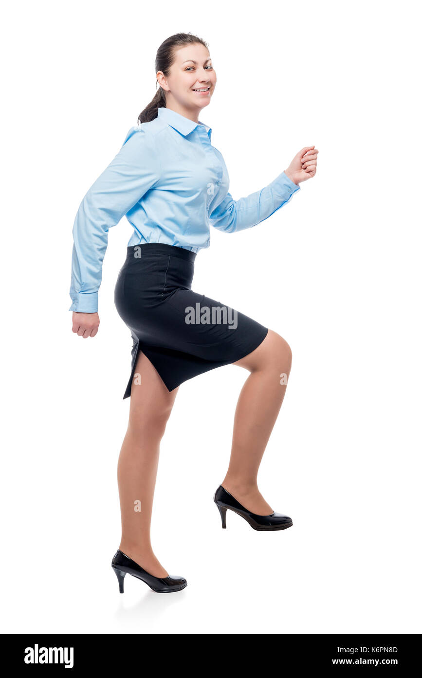 Portrait of a woman climbing up the career ladder - concept Stock Photo