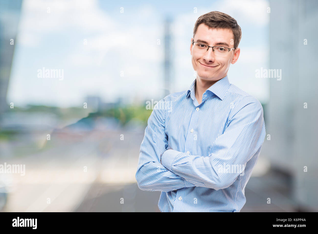 Smiling entrepreneur posing in office Stock Photo