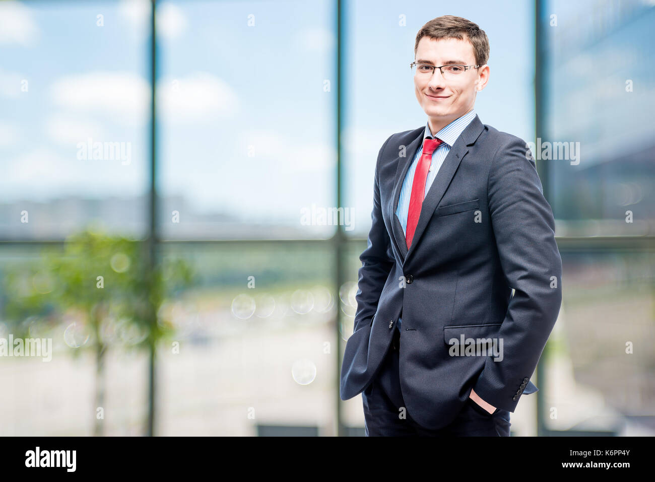 Successful businessman posing in office Stock Photo